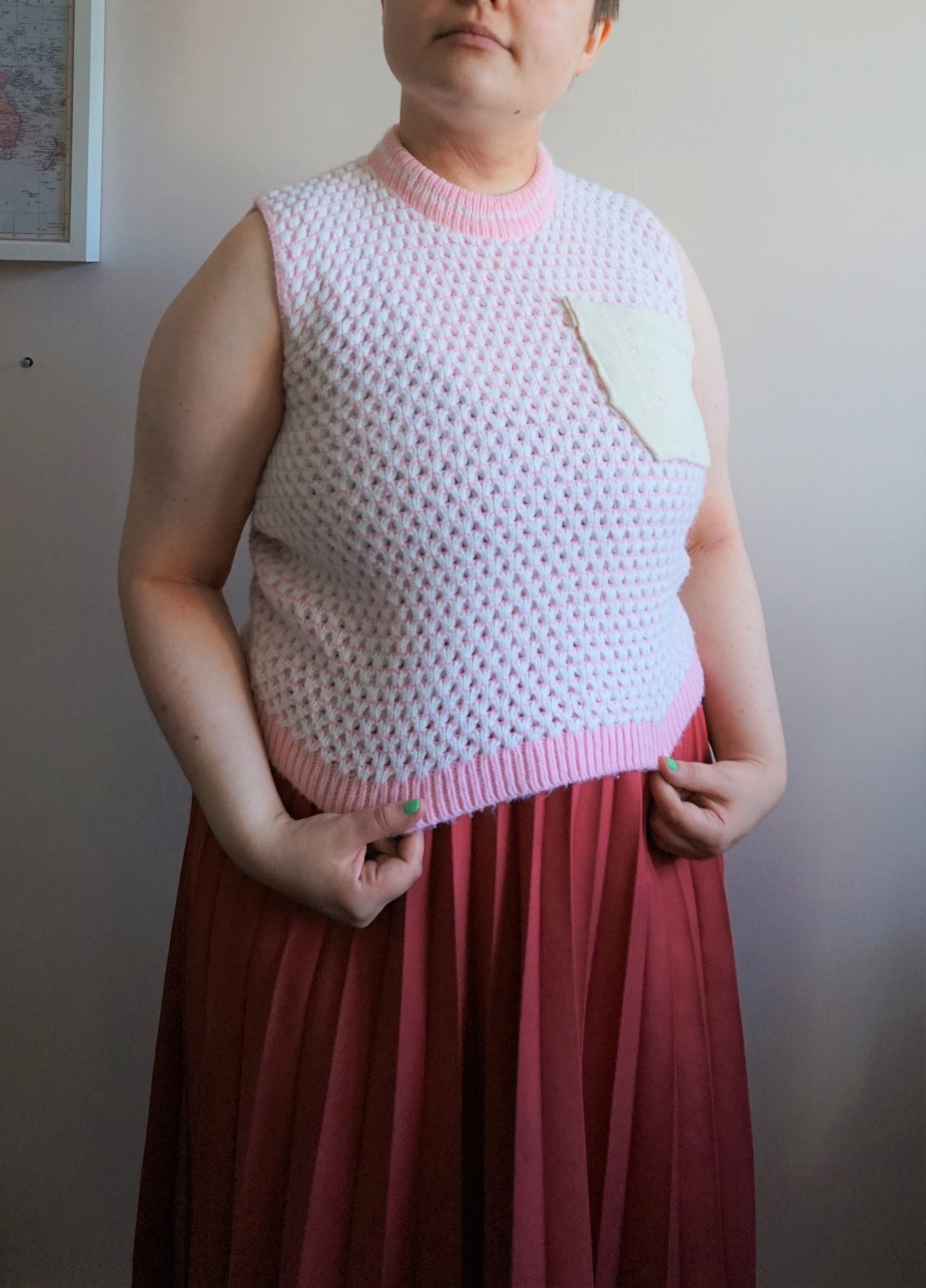 Knitted tank top with attached pocket