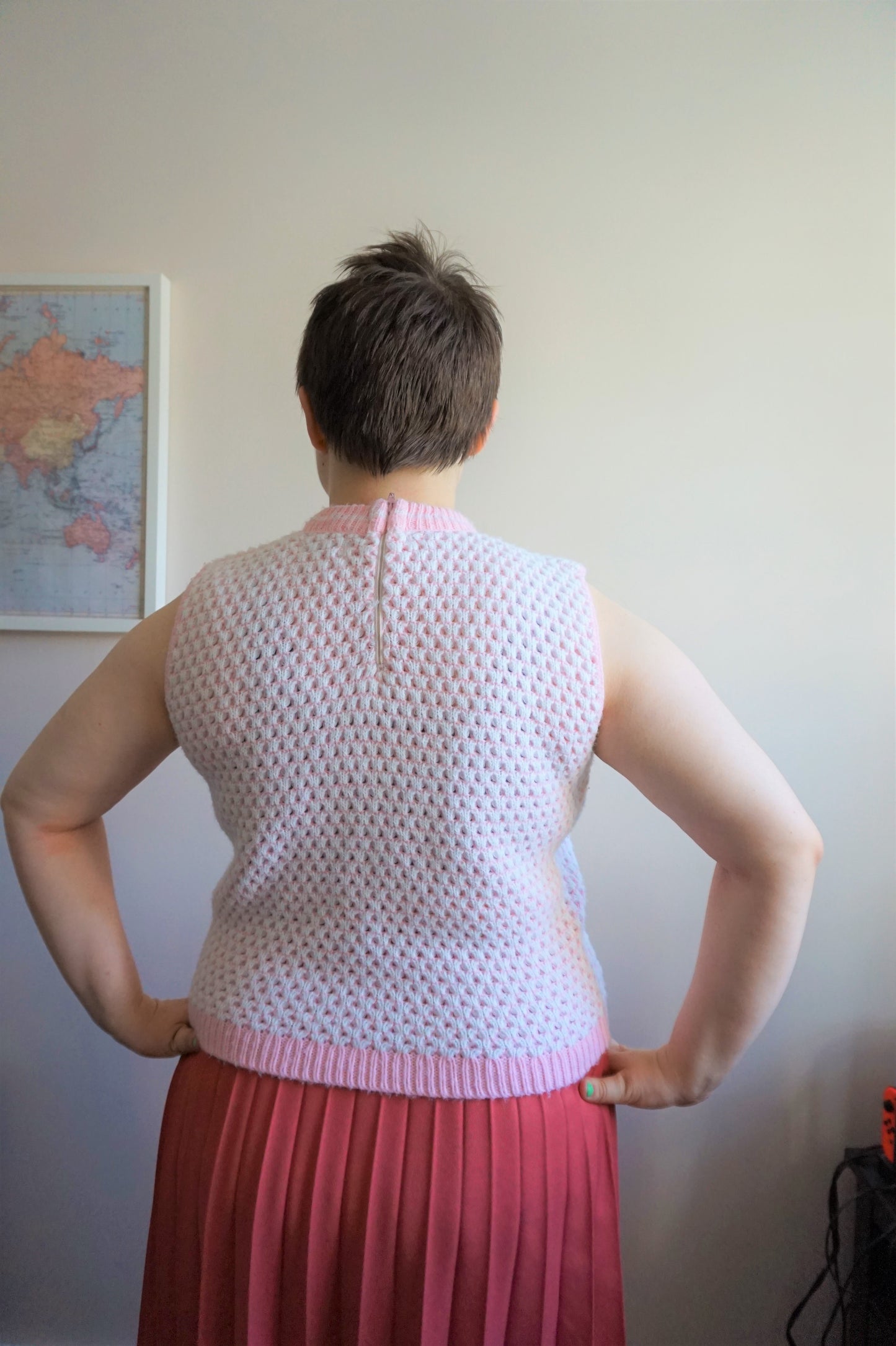 Knitted tank top with attached pocket